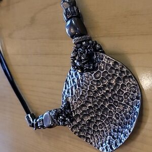 Chico's Bronze Tone Medallion with Faux Leather Sides